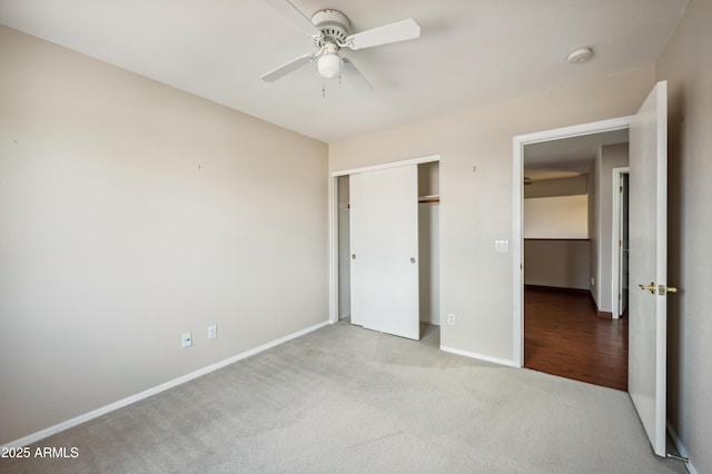 3905 S Bridal Vail Dr, Gilbert, AZ 85297 - unfurnished bedroom featuring carpet, baseboards, a closet, and a ceiling fan