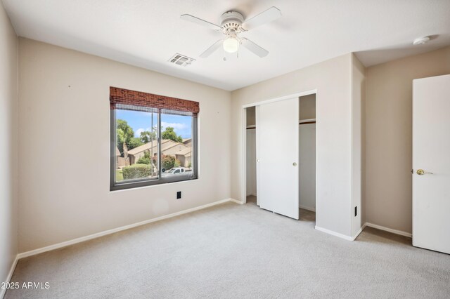 3905 S Bridal Vail Dr, Gilbert, AZ 85297 - unfurnished bedroom with carpet flooring, baseboards, a closet, and a ceiling fan