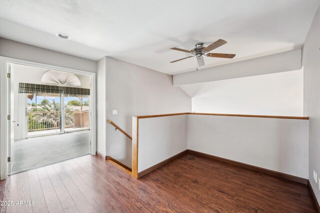 3905 S Bridal Vail Dr, Gilbert, AZ 85297 - spare room featuring baseboards, wood finished floors, and ceiling fan