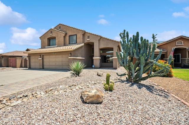 3905 S Bridal Vail Dr, Gilbert, AZ 85297 - mediterranean / spanish-style house featuring stucco siding, driveway, and a tile roof