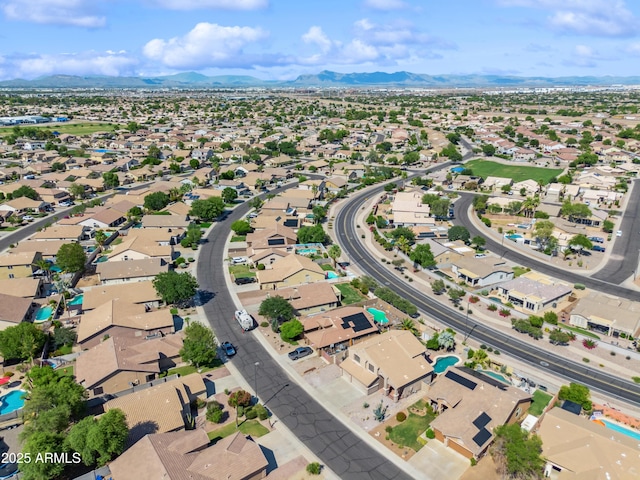 3905 S Bridal Vail Dr, Gilbert, AZ 85297 - aerial overview of property's location with a mountainous background and nearby suburban area