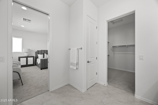 bathroom featuring recessed lighting, baseboards, and visible vents