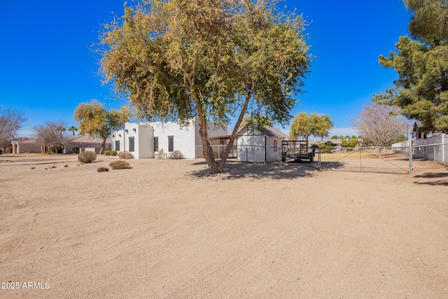 exterior space with a gate and fence