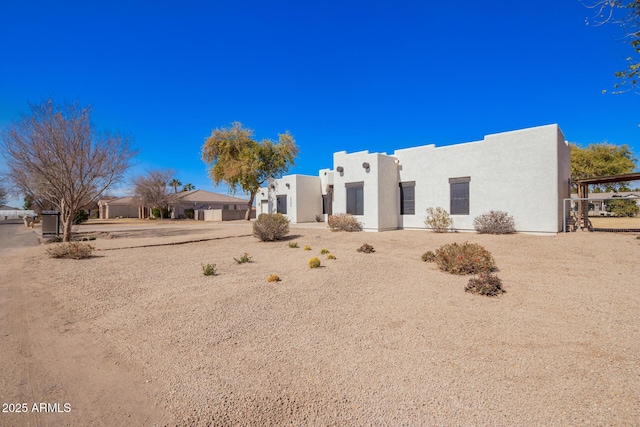 exterior space with stucco siding