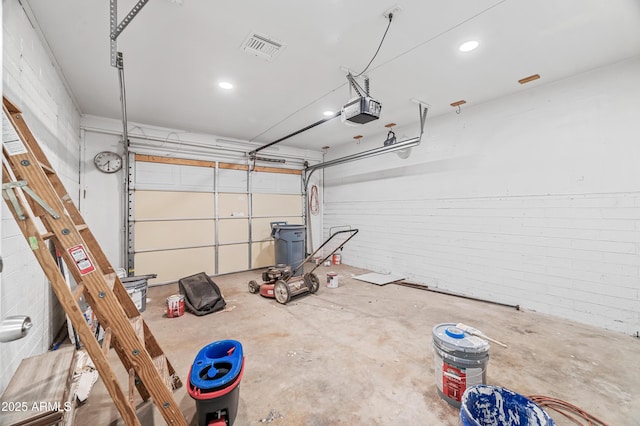 garage featuring a garage door opener