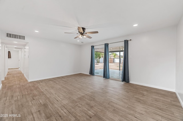 spare room with ceiling fan