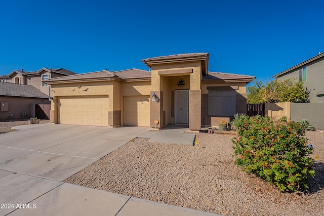 prairie-style home with a garage