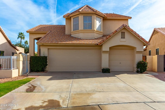 view of front of property featuring a garage