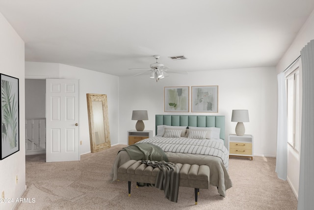 carpeted bedroom featuring ceiling fan