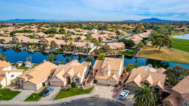 aerial view with a water and mountain view