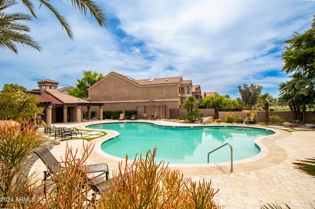 view of patio featuring a grill