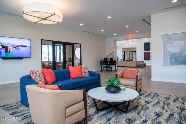 living room with a high ceiling