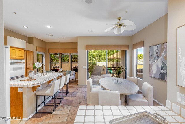 living room with ceiling fan