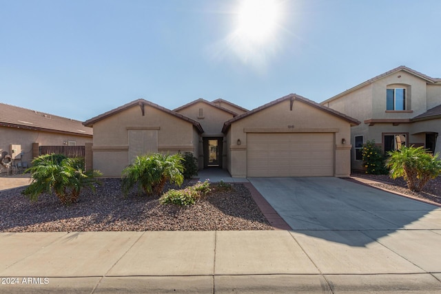 view of front of home with a garage