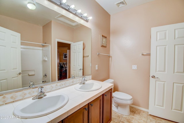 full bathroom with toilet, vanity, bathing tub / shower combination, and tile patterned floors