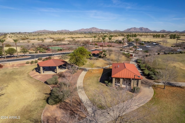 birds eye view of property with a mountain view