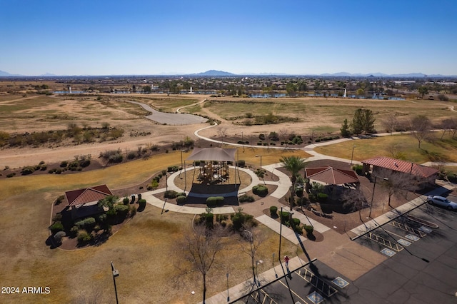 birds eye view of property featuring a mountain view