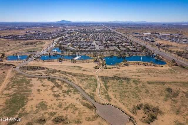 bird's eye view featuring a water and mountain view