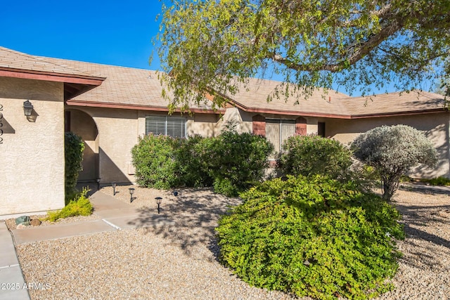 exterior space with stucco siding