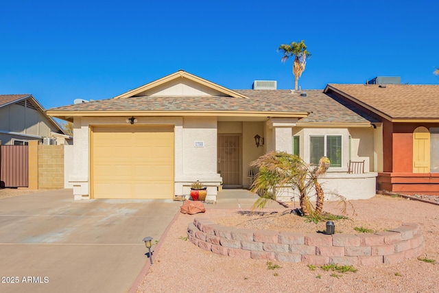 ranch-style house featuring a garage