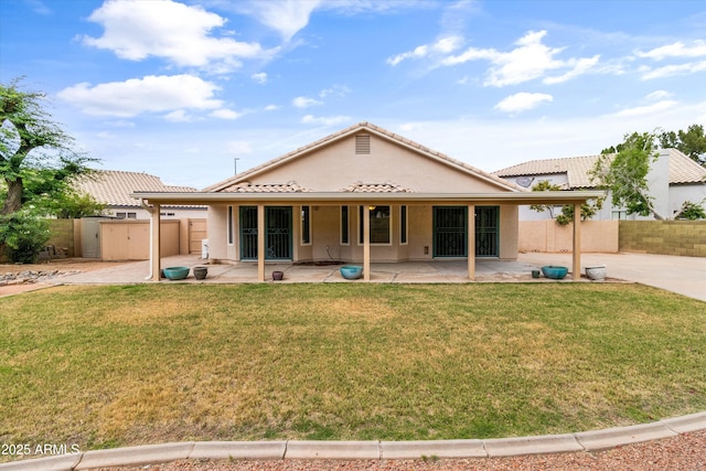 662 S Saddle St, Gilbert, AZ 85233 - rear view of house featuring a patio, stucco siding, and a tiled roof