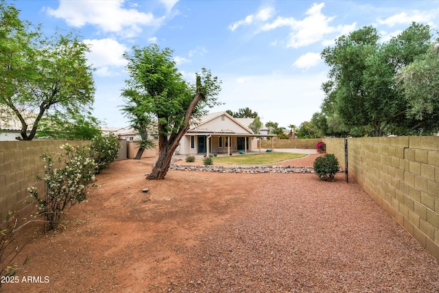 662 S Saddle St, Gilbert, AZ 85233 - fenced backyard with a patio