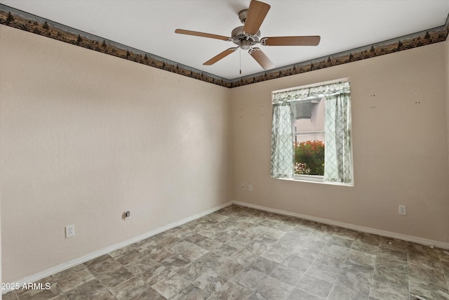 662 S Saddle St, Gilbert, AZ 85233 - spare room featuring ceiling fan, baseboards, and stone finish flooring