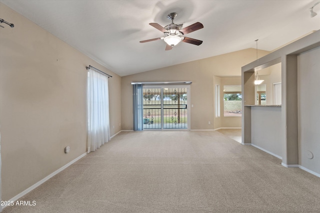 662 S Saddle St, Gilbert, AZ 85233 - unfurnished living room featuring lofted ceiling, a ceiling fan, carpet, and baseboards