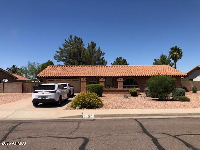 1156 E Vinedo Ln, Tempe, AZ 85284 - view of front of property featuring a tile roof, concrete driveway, and an attached garage