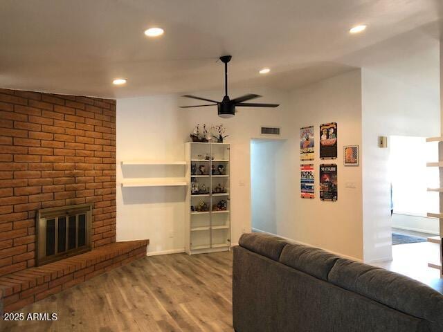 1156 E Vinedo Ln, Tempe, AZ 85284 - living area featuring ceiling fan, wood finished floors, recessed lighting, baseboards, and a fireplace