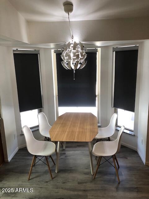 1156 E Vinedo Ln, Tempe, AZ 85284 - dining room featuring a chandelier, baseboards, and wood finished floors
