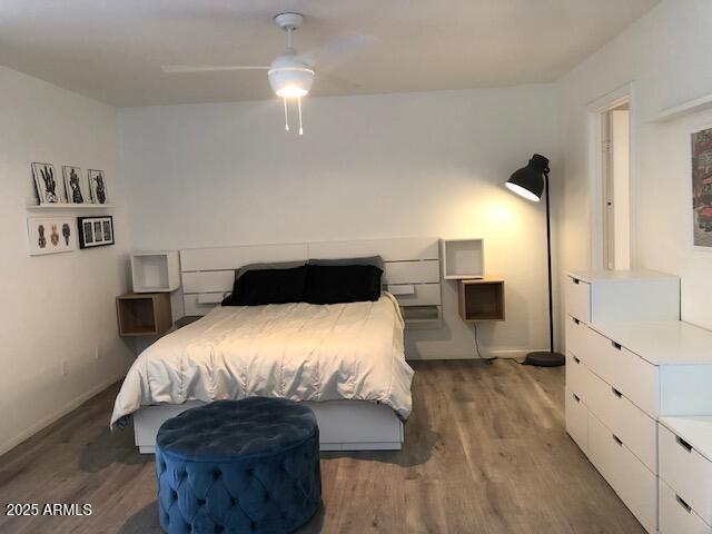 1156 E Vinedo Ln, Tempe, AZ 85284 - bedroom with wood finished floors, baseboards, and ceiling fan