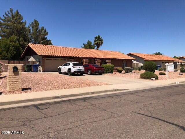 1156 E Vinedo Ln, Tempe, AZ 85284 - view of front of property with a garage, a tiled roof, and concrete driveway