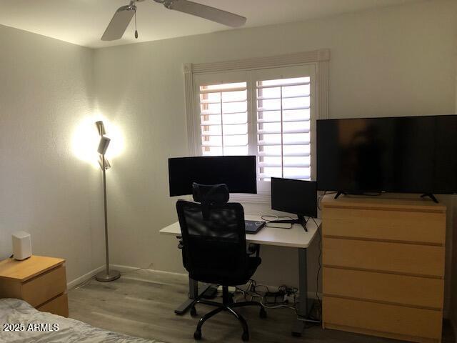 1156 E Vinedo Ln, Tempe, AZ 85284 - home office with a ceiling fan, light wood-style flooring, and baseboards
