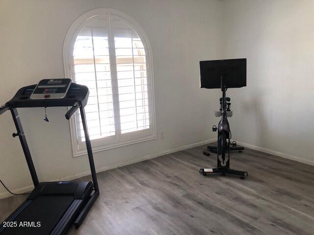 1156 E Vinedo Ln, Tempe, AZ 85284 - workout room with wood finished floors and baseboards