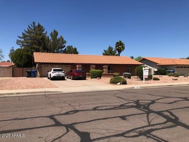 1156 E Vinedo Ln, Tempe, AZ 85284 - view of front of home featuring a garage, a tile roof, and driveway