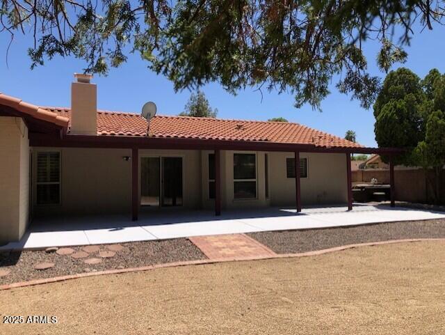 1156 E Vinedo Ln, Tempe, AZ 85284 - rear view of property featuring a patio area, a tile roof, a chimney, and stucco siding
