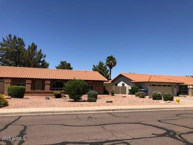 1156 E Vinedo Ln, Tempe, AZ 85284 - single story home featuring a tiled roof, an attached garage, and stucco siding