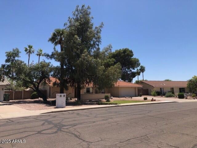 1156 E Vinedo Ln, Tempe, AZ 85284 - view of front of property featuring driveway, a garage, and a tiled roof