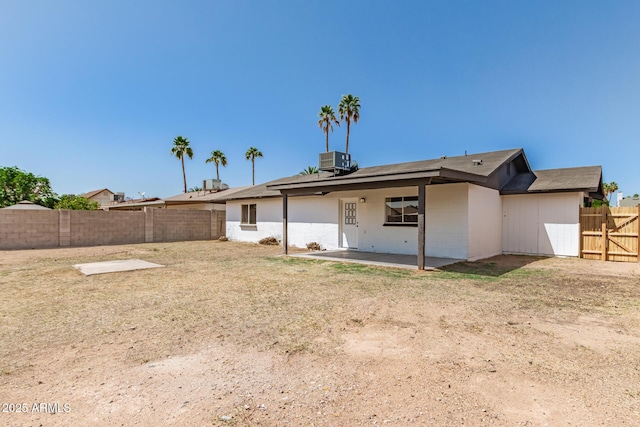 6351 W Mountain View Rd, Glendale, AZ 85302 - rear view of property featuring a fenced backyard, a patio, and central air condition unit