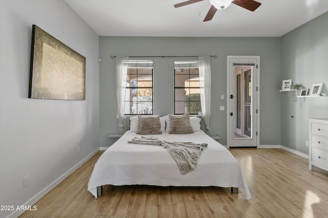 bedroom with light hardwood / wood-style flooring and ceiling fan