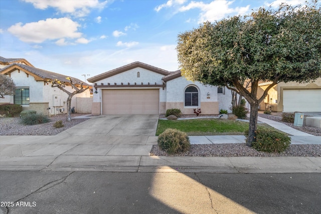 view of front of property with a garage