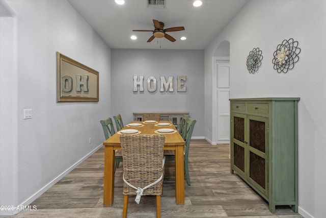 dining room featuring hardwood / wood-style floors and ceiling fan