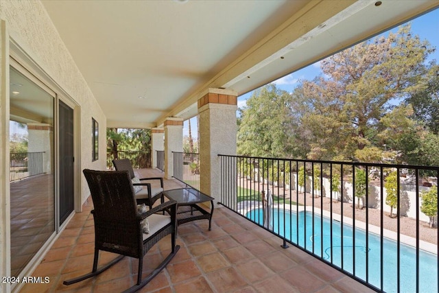 balcony featuring a patio area