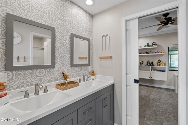 bathroom featuring ceiling fan and vanity