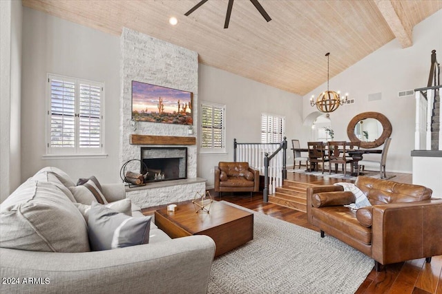 living room with wooden ceiling, ceiling fan with notable chandelier, a fireplace, and dark hardwood / wood-style floors