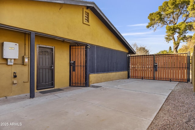 exterior space with a gate and fence