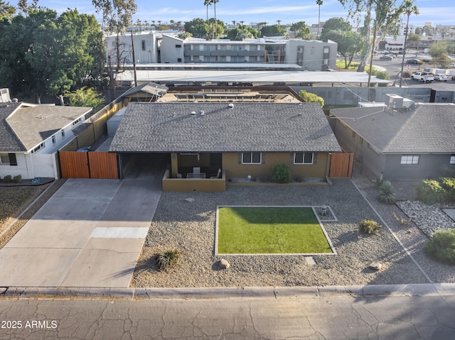 birds eye view of property with a residential view