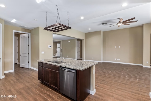 kitchen with ceiling fan, dishwasher, hardwood / wood-style floors, and sink