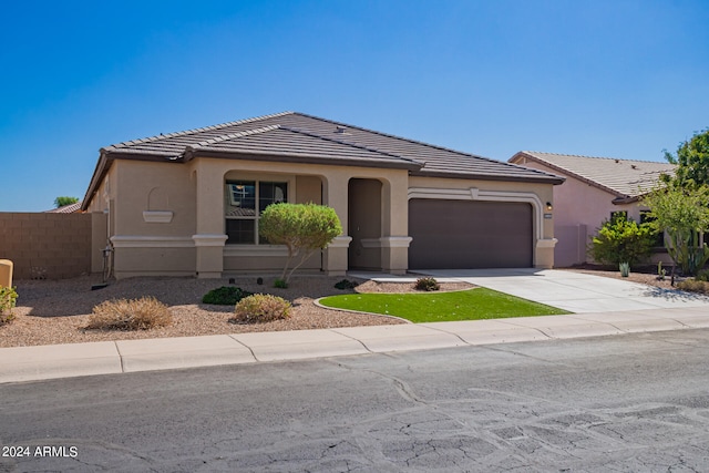 view of front of property featuring a garage